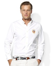 Cut for a trim, modern fit from silky cotton poplin, a long-sleeved sport shirt is emboldened with cricket-inspired embroidery at the chest for a preppy finish. Cut for a trim, modern fit from silky cotton poplin, a long-sleeved sport shirt is emboldened with cricket-inspired embroidery at the chest for a preppy finish.