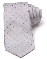 An 80s-inspired pattern from Michael Kors is wrought in lavish silk for a luxuriously soft hand, perfect for cocktail parties or wear it to work for a spirited look. An 80s-inspired pattern from Michael Kors is wrought in lavish silk for a luxuriously soft hand, perfect for cocktail parties or wear it to work for a spirited look.