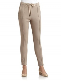THE LOOKElastic waist with drawstring tie closureAngled pocketsTailored crease down front and back legsZip cuffsTHE FITRise, about 8Inseam, about 33THE MATERIAL52% polyester/43% wool/5% elastaneSilk liningCARE & ORIGINDry cleanMade in ItalyModel shown is 5'10 (177cm) wearing US size 4. THE LOOKElastic waist with drawstring tie closureAngled pocketsTailored crease down front and back legsZip cuffsTHE FITRise, about 8Inseam, about 33THE MATERIAL52% polyester/43% wool/5% elastaneSilk liningCARE & ORIGINDry cleanMade in ItalyModel shown is 5'10 (177cm) wearing US size 4.