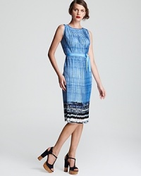 Plunge to dramatic style depths with this Elie Tahari dress. A vibrant cascade of pleats defines an effortless silhouette, while a vivid crush of abstract print finishes the style with modern flair. Plunge to dramatic style depths with this Elie Tahari dress. A vibrant cascade of pleats defines an effortless silhouette, while a vivid crush of abstract print finishes the style with modern flair.