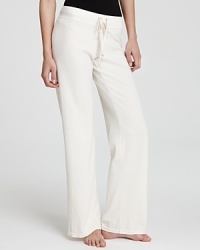 Ease into the season with classic Juicy Couture terry pants, perfect for weekend lounging or layering over swimsuits for effortless summer style. Ease into the season with classic Juicy Couture terry pants, perfect for weekend lounging or layering over swimsuits for effortless summer style.