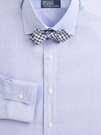 A modern fit crafted in soft cotton for a tailored, professional look.ButtonfrontModerate spread collarCottonMachine washImported A modern fit crafted in soft cotton for a tailored, professional look.ButtonfrontModerate spread collarCottonMachine washImported