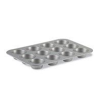 Bake perfectly moist, delicious muffins and cupcakes for years to come with this durable pan by Calphalon. Expertly constructed to the standards of culinary professionals, it features two interlocking layers of high-performance nonstick for beautiful results and clean, easy release. Bake perfectly moist, delicious muffins and cupcakes for years to come with this durable pan by Calphalon. Expertly constructed to the standards of culinary professionals, it features two interlocking layers of high-performance nonstick for beautiful results and clean, easy release.