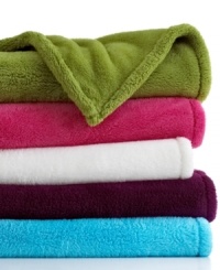 Time to get cozy! Wrap up in sumptuous softness with this exceptionally fluffy throw, perfect for curling up on the couch or an extra layer of warmth for the bed. Featuring lightweight warmth and easy-care convenience. Time to get cozy! Wrap up in sumptuous softness with this exceptionally fluffy throw, perfect for curling up on the couch or an extra layer of warmth for the bed. Featuring lightweight warmth and easy-care convenience.