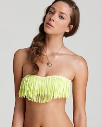 There's something fashion-forward about L*Space's fringed bandeau. Hinting at flirtatious but wholly feminine, this daring suit is destined to stun when you shimmy in the sun. There's something fashion-forward about L*Space's fringed bandeau. Hinting at flirtatious but wholly feminine, this daring suit is destined to stun when you shimmy in the sun.