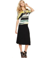 Trend-right, midi length meets fluid, a-line design on a closet-staple-chic skirt from Kensie. Trend-right, midi length meets fluid, a-line design on a closet-staple-chic skirt from Kensie.