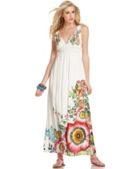 A burst of bold florals make a bright statement on this Desigual maxi dress, perfect for summer style! A burst of bold florals make a bright statement on this Desigual maxi dress, perfect for summer style!