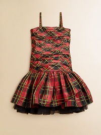 Inspired by vintage Americana, this pretty tartan plaid design features ruching and a full tulle skirt for a stylish silhouette.Straight necklineSpaghetti strapsInvisible side zipperDrop-waistRuffled skirt with exposed petticoatFully linedSilkDry cleanImportedNecklace shown not sold Inspired by vintage Americana, this pretty tartan plaid design features ruching and a full tulle skirt for a stylish silhouette.Straight necklineSpaghetti strapsInvisible side zipperDrop-waistRuffled skirt with exposed petticoatFully linedSilkDry cleanImportedNecklace shown not sold