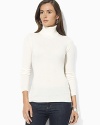 Luxurious cashmere yarns infuse the perennial turtleneck with a note of classic elegance.