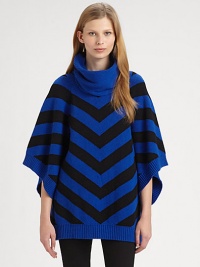 EXCLUSIVELY AT SAKS. Contrasting chevron pattern and an oversized funnelneck renew this wool-blend poncho sweater. Oversized ribbed funnelneckPoncho sleevesRibbed cuffs and hemAbout 27 from shoulder to hem40% cotton/40% nylon/20% woolDry cleanImportedModel shown is 5'9 (176cm) wearing US size X-Small/Small.