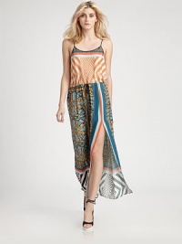Graphically-chic in a vibrant, bohemian print on this floor-sweeping chiffon shift.Spaghetti strapsScoopneckBlouson bodiceDrawstring waistFront slitAbout 39 from natural waistPolyesterDry cleanMade in USA of imported fabricModel shown is 5'11 (180cm) wearing US size Small. Graphically-chic in a vibrant, bohemian print on this floor-sweeping chiffon shift.Spaghetti strapsScoopneckBlouson bodiceDrawstring waistFront slitAbout 39 from natural waistPolyesterDry cleanMade in USA of imported fabricModel shown is 5'11 (180cm) wearing US size Small.
