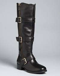 Buckled straps add horizontal contrast that breaks up these Boutique 9 tall boots. Pops of metallic hardware liven up a work-to-play basic. Buckled straps add horizontal contrast that breaks up these Boutique 9 tall boots. Pops of metallic hardware liven up a work-to-play basic.