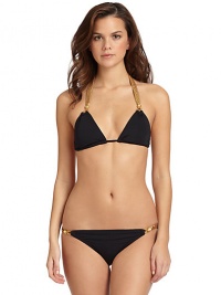 THE LOOKContrast braided halter straps tie at neckTextured golden bead accentsAdjustable padded triangle cupsBack tie closureTHE MATERIAL87% nylon/13% spandexFully linedCARE & ORIGINHand washImportedPlease note: Bikini bottom sold separately. THE LOOKContrast braided halter straps tie at neckTextured golden bead accentsAdjustable padded triangle cupsBack tie closureTHE MATERIAL87% nylon/13% spandexFully linedCARE & ORIGINHand washImportedPlease note: Bikini bottom sold separately.