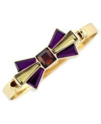 Tie something new. This bracelet from BCBGeneration is crafted from gold-tone mixed metal with faceted stones in light topaz and shades of purple to make up a stylish bow. Approximate length: 8 inches. Approximate diameter: 2-1/2 inches. Tie something new. This bracelet from BCBGeneration is crafted from gold-tone mixed metal with faceted stones in light topaz and shades of purple to make up a stylish bow. Approximate length: 8 inches. Approximate diameter: 2-1/2 inches.