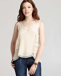 Cut from rich silk, this Joie top features an intricate eyelet pattern adorned with sparkling beads. Cut from rich silk, this Joie top features an intricate eyelet pattern adorned with sparkling beads.