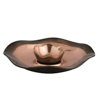 The Copper Canyon Collection was inspired by the designer's many trips to the canyons of the southwest. Grand Canyon, Arches National Park, Bryce Canyon and others. These canyons are carved from water and wind. The coppery sand and desert flora are referenced by the copper and verdigris on the ripples and ridges of Nambé's Copper Canyon Collection. The Copper Canyon Collection was inspired by the designer's many trips to the canyons of the southwest. Grand Canyon, Arches National Park, Bryce Canyon and others. These canyons are carved from water and wind. The coppery sand and desert flora are referenced by the copper and verdigris on the ripples and ridges of Nambé's Copper Canyon Collection.