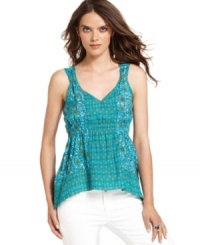Crisp batik-inspired florals bloom on this boho-chic tank top from DKNY Jeans. Pairs well with denim in any shade you like! Crisp batik-inspired florals bloom on this boho-chic tank top from DKNY Jeans. Pairs well with denim in any shade you like!