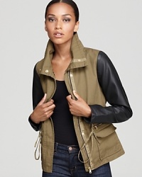 Exude downtown cool in this color-blocked Aqua jacket, sporting sleek faux-leather sleeves on a military-inspired silhouette. Exude downtown cool in this color-blocked Aqua jacket, sporting sleek faux-leather sleeves on a military-inspired silhouette.