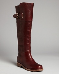 These tall boots are ruggedly handsome enough for a casual weekend, yet put together enough for the the office, with neat cap toe and buckle details; by Belle by Sigerson Morrison. These tall boots are ruggedly handsome enough for a casual weekend, yet put together enough for the the office, with neat cap toe and buckle details; by Belle by Sigerson Morrison.
