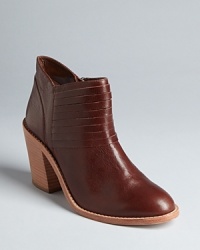 Wrap up the Western look in this ultra-chic Loeffler Randall booties, with strappy accents and stacked, cowgirl-style heels. Wrap up the Western look in this ultra-chic Loeffler Randall booties, with strappy accents and stacked, cowgirl-style heels.
