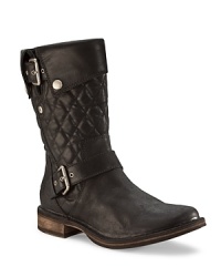 These rough-and-ready UGG® Australia moto boots get an upscale twist from luxe quilted uppers. These rough-and-ready UGG® Australia moto boots get an upscale twist from luxe quilted uppers.