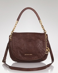 A closet essential: This MICHAEL Michael Kors leather shoulder bag puts a jet-settingly glamorous spin on a classic shape. It's a simple luxury that you'll carry forever. A closet essential: This MICHAEL Michael Kors leather shoulder bag puts a jet-settingly glamorous spin on a classic shape. It's a simple luxury that you'll carry forever.