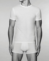 A multipack of 3 crew neck t-shirts from Emporio Armani's men's underwear line made from soft, pure combed cotton jersey for a comfortable, timeless look and feel. Tagless. A multipack of 3 crew neck t-shirts from Emporio Armani's men's underwear line made from soft, pure combed cotton jersey for a comfortable, timeless look and feel. Tagless.