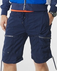 Metal zippers and grommets give a modern moto-inspired look to an essential cargo short in lightweight cotton poplin. Metal zippers and grommets give a modern moto-inspired look to an essential cargo short in lightweight cotton poplin.
