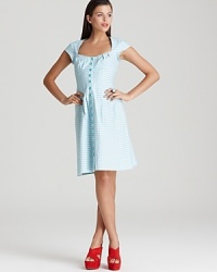 Exude sweetness this season in a Nanette Lepore stripe dress. With the season's must-have flare skirt--the peek-a-boo cut-out at the back adds a playful finish. Exude sweetness this season in a Nanette Lepore stripe dress. With the season's must-have flare skirt--the peek-a-boo cut-out at the back adds a playful finish.