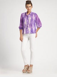 An easy-fit button-down shaped by soft pleats at the shoulders and gathered three-quarter sleeves, all in tie-dyed stretch silk.Band collarButton-down placketThree-quarter sleevesShirred cuffsShirttail hemBack yokeAbout 24 from shoulder to hem96% silk/4% spandexDry cleanImportedModel shown is 5'10 (177cm) wearing US size Small. An easy-fit button-down shaped by soft pleats at the shoulders and gathered three-quarter sleeves, all in tie-dyed stretch silk.Band collarButton-down placketThree-quarter sleevesShirred cuffsShirttail hemBack yokeAbout 24 from shoulder to hem96% silk/4% spandexDry cleanImportedModel shown is 5'10 (177cm) wearing US size Small.