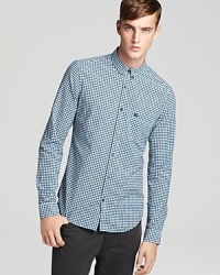 A mini gingham check adorns this modern slim-fit sport shirt from Burberry Brit. A mini gingham check adorns this modern slim-fit sport shirt from Burberry Brit.