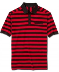 Bold stripes bring this Sean John polo up from standard to standout. Bold stripes bring this Sean John polo up from standard to standout.