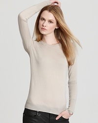 Rendered in sumptuous merino wool, this Burberry Brit sweater touts a clean silhouette and check-lined cuffs for an endlessly chic, yet cozy, style essential. Rendered in sumptuous merino wool, this Burberry Brit sweater touts a clean silhouette and check-lined cuffs for an endlessly chic, yet cozy, style essential.