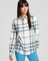 Subtly textured and artfully faded, a well-worn Burberry Brit shirt imbues your off-duty style with a touch of the Old West. Subtly textured and artfully faded, a well-worn Burberry Brit shirt imbues your off-duty style with a touch of the Old West.