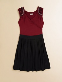 A perfect blend of past and present, with dazzling jeweled shoulders and a posh pleated skirt.Surplice necklineEmbellished shouldersSleevelessPull-on styleCircle skirt95% viscose/5% spandexMachine washImported A perfect blend of past and present, with dazzling jeweled shoulders and a posh pleated skirt.Surplice necklineEmbellished shouldersSleevelessPull-on styleCircle skirt95% viscose/5% spandexMachine washImported
