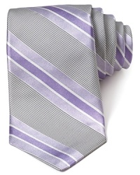 In a traditional palette, this handsomely striped tie from Ike Behar lends a sophisticated look. In a traditional palette, this handsomely striped tie from Ike Behar lends a sophisticated look.