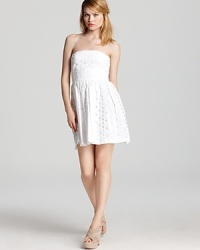 A soft cotton Aqua dress adorned with oversized eyelets takes on the season's white trend with feminine charm. Finished with an exposed back zipper, the charismatic silhouette is the prime example of chic. A soft cotton Aqua dress adorned with oversized eyelets takes on the season's white trend with feminine charm. Finished with an exposed back zipper, the charismatic silhouette is the prime example of chic.
