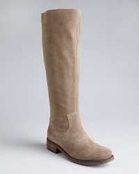 DV Dolce Vita marries Western influences with a downtown vibe in boldly basic zip up flat boots. DV Dolce Vita marries Western influences with a downtown vibe in boldly basic zip up flat boots.