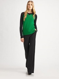 Reed's iconic baseball-inspired sweater, updated for the season in a looser silhouette with a notched inset neckline.Rib-knit crewneck with V detailLong sleevesBody: merino woolSleeves: silkDry cleanImported of Italian fabricModel shown is 5'9½ (176cm) wearing US size Small. Reed's iconic baseball-inspired sweater, updated for the season in a looser silhouette with a notched inset neckline.Rib-knit crewneck with V detailLong sleevesBody: merino woolSleeves: silkDry cleanImported of Italian fabricModel shown is 5'9½ (176cm) wearing US size Small.