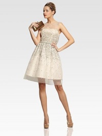 Glittering sequins highlight filmy chiffon in this ethereal fit-and-flare frock.Jewel necklineSleevelessBlouson bodiceElastic waistGathered skirtCut-out backTop button closureCenter back zipperAbout 24 from natural waistNylon/spandexDry cleanImportedModel shown is 5'10 (177cm) wearing US size 4. Glittering sequins highlight filmy chiffon in this ethereal fit-and-flare frock.Jewel necklineSleevelessBlouson bodiceElastic waistGathered skirtCut-out backTop button closureCenter back zipperAbout 24 from natural waistNylon/spandexDry cleanImportedModel shown is 5'10 (177cm) wearing US size 4.