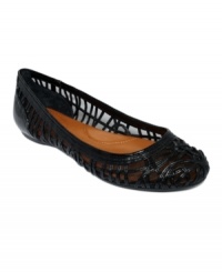 Sheer sensation. Woven leather on mesh creates a high-fashion effect on the Idella flats by Calvin Klein.