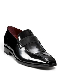 Square toe slip-ons with decorative band across middle. Elastic inserts for comfort and flexibility. BOSS embossed on side. Rubber heel for added grip. Square toe slip-ons with decorative band across middle. Elastic inserts for comfort and flexibility. BOSS embossed on side. Rubber heel for added grip.