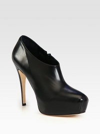 Must-have ankle boot of supple leather, lifted with a significant heel and platform. Self-covered heel, 4¾ (120mm)Hidden platform, 1¼ (30mm)Compares to a 3½ heel (90mm)Leather upperSide zipLeather lining and solePadded insoleMade in ItalyOUR FIT MODEL RECOMMENDS ordering one half size up as this style runs small. Must-have ankle boot of supple leather, lifted with a significant heel and platform. Self-covered heel, 4¾ (120mm)Hidden platform, 1¼ (30mm)Compares to a 3½ heel (90mm)Leather upperSide zipLeather lining and solePadded insoleMade in ItalyOUR FIT MODEL RECOMMENDS ordering one half size up as this style runs small.