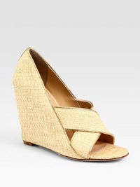 Trimmed in shimmery metallic leather, this woven raffia design has a high wedge and criss-cross straps. Raffia and metallic leather wedge, 4½ (115mm)Raffia and metallic leather upperLeather lining and solePadded insoleImportedOUR FIT MODEL RECOMMENDS ordering one half size up as this style runs small. Trimmed in shimmery metallic leather, this woven raffia design has a high wedge and criss-cross straps. Raffia and metallic leather wedge, 4½ (115mm)Raffia and metallic leather upperLeather lining and solePadded insoleImportedOUR FIT MODEL RECOMMENDS ordering one half size up as this style runs small.