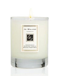 Add the finishing touch to your home by decorating interiors with the refreshingly delicious scent of Grapefruit. This 60g scented travel candle will help create the perfect ambiance in any room. Fifteen hour burn time. Add the finishing touch to your home by decorating interiors with the refreshingly delicious scent of Grapefruit. This 60g scented travel candle will help create the perfect ambiance in any room. Fifteen hour burn time.