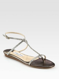 Bejeweled intersecting straps form this comfortable design for a chic look from tip to toe. Glitter-coated fabric upperAdjustable ankle strapMetallic leather liningLeather solePadded insoleMade in Italy Bejeweled intersecting straps form this comfortable design for a chic look from tip to toe. Glitter-coated fabric upperAdjustable ankle strapMetallic leather liningLeather solePadded insoleMade in Italy