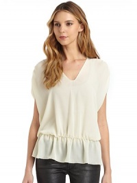 THE LOOKSemi-sheerDouble v-neckRuched short dolman sleevesGathered, elastic drop-waistPeplum hemTHE FITAbout 28 from shoulder to hemTHE MATERIALPolyesterCARE & ORIGINDry cleanImportedModel shown is 5'10 (177cm) wearing US size Small.This item was originally available for purchase at Saks Fifth Avenue OFF 5TH stores. THE LOOKSemi-sheerDouble v-neckRuched short dolman sleevesGathered, elastic drop-waistPeplum hemTHE FITAbout 28 from shoulder to hemTHE MATERIALPolyesterCARE & ORIGINDry cleanImportedModel shown is 5'10 (177cm) wearing US size Small.This item was originally available for purchase at Saks Fifth Avenue OFF 5TH stores.