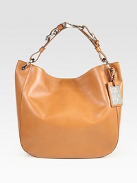 This easy silhouette of butter-soft leather is upgraded with an equestrian-inspired handle and iconic luggage tag. Adjustable chain and leather shoulder strap, 4¾-5¼ dropMagnetic top closureLogo-embossed metal luggage tagOne inside zip pocketTwo inside open pocketsCotton lining12W X 12½H X 4¾DMade in Italy This easy silhouette of butter-soft leather is upgraded with an equestrian-inspired handle and iconic luggage tag. Adjustable chain and leather shoulder strap, 4¾-5¼ dropMagnetic top closureLogo-embossed metal luggage tagOne inside zip pocketTwo inside open pocketsCotton lining12W X 12½H X 4¾DMade in Italy