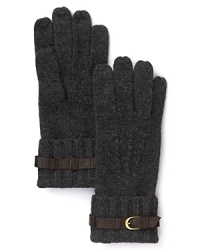 A leather buckle detail and ribbing at the wrist give these warm gloves from Portolano a memorable touch. A leather buckle detail and ribbing at the wrist give these warm gloves from Portolano a memorable touch.