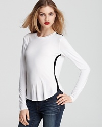 Contrast stripes lend a graphic punch to this wear-forever Theory top. Contrast stripes lend a graphic punch to this wear-forever Theory top.